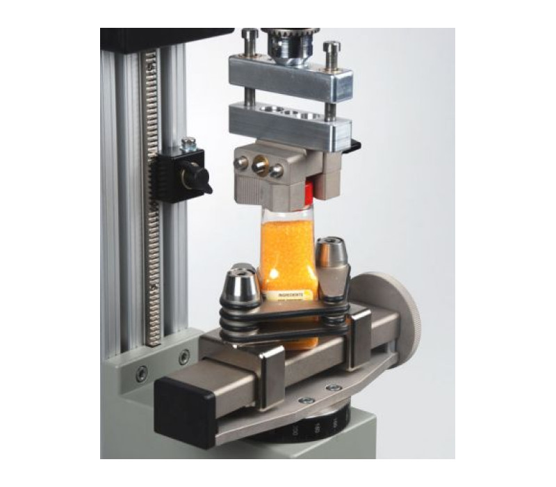 Test setup met G1023 flessen Grip, G1053 V-Jaw Grip en AC1029 Axiale Compensator.