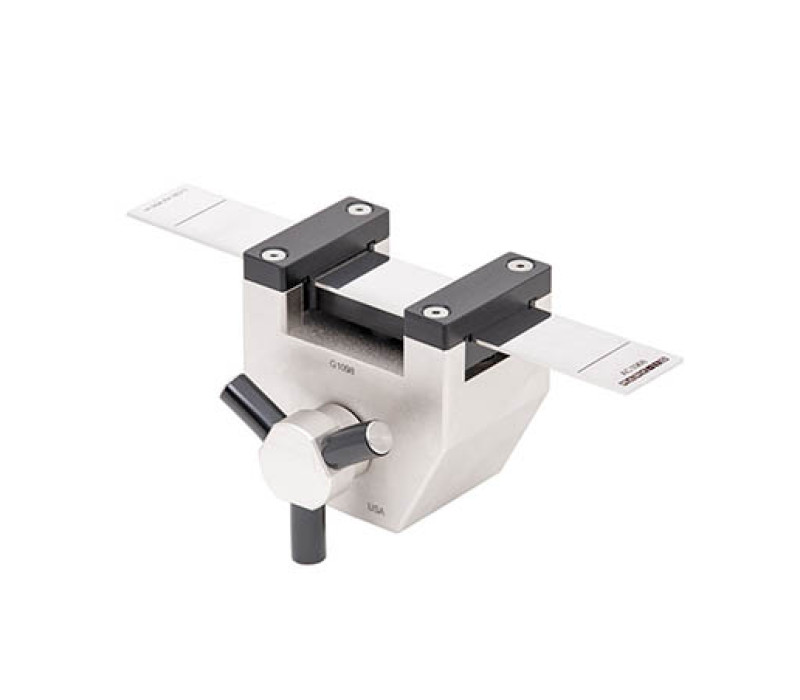 De G1098-lus tack armatuur bevat een indexeerbare teststrip met drie testlocaties. Beschikt over een met een hendel bediende stripklem