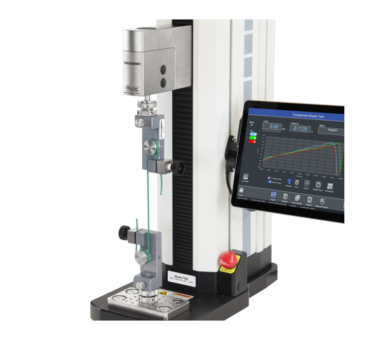 Een verticale draadtrektest met twee G1103 draad-/kabelgrepen en een F305 Advanced Test Frame.