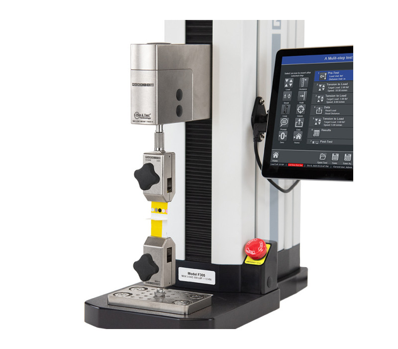 F305 trekbank geconfigureerd voor peel test met twee G1008 Folie &amp; Papier Grepen
