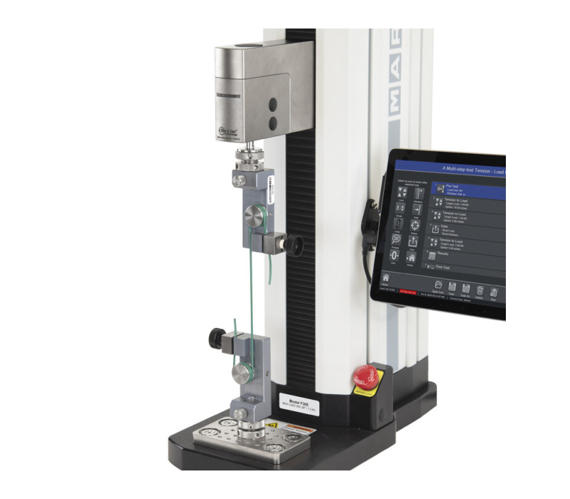 F305 trekbank geconfigureerd voor draadtrektest met twee G1103 Draad Grepen