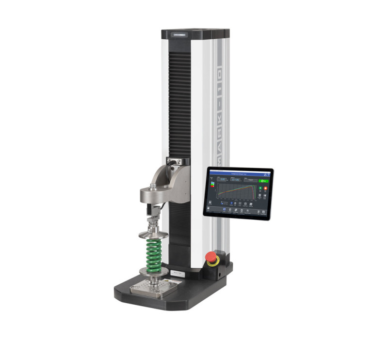 F755S trekbank geconfigureerd voor drukveertest met twee G1087 High Capacity Compression Plates