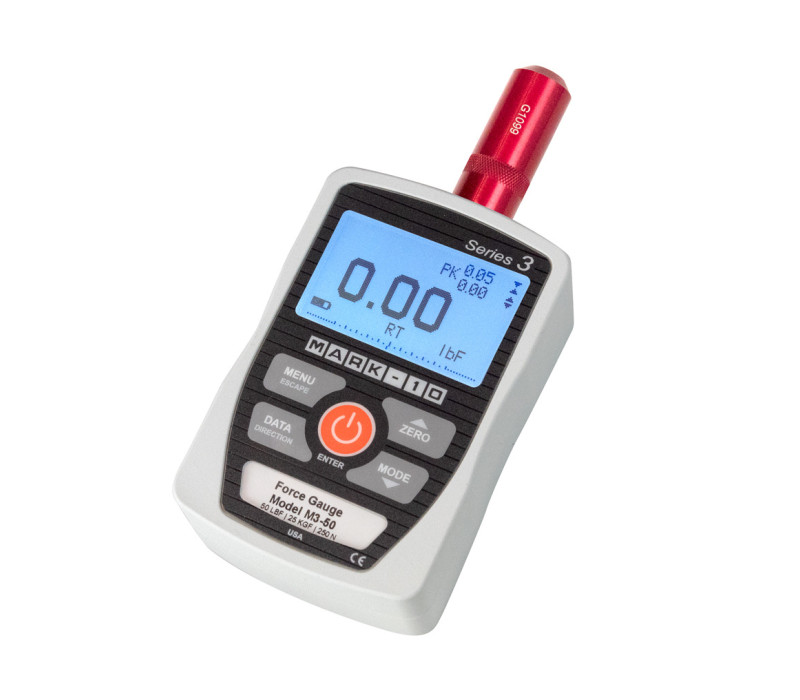 De G1099 wordt hier weergegeven, bevestigd aan een M3-50 krachtmeter.